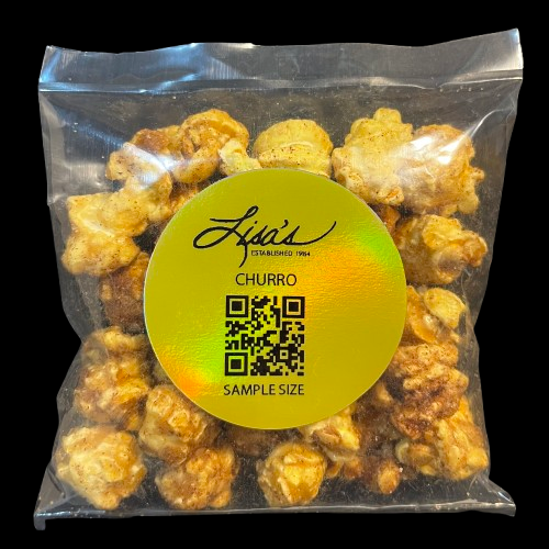 Sample size bag of Lisa's Churro Popcorn with cinnamon and sugar coating