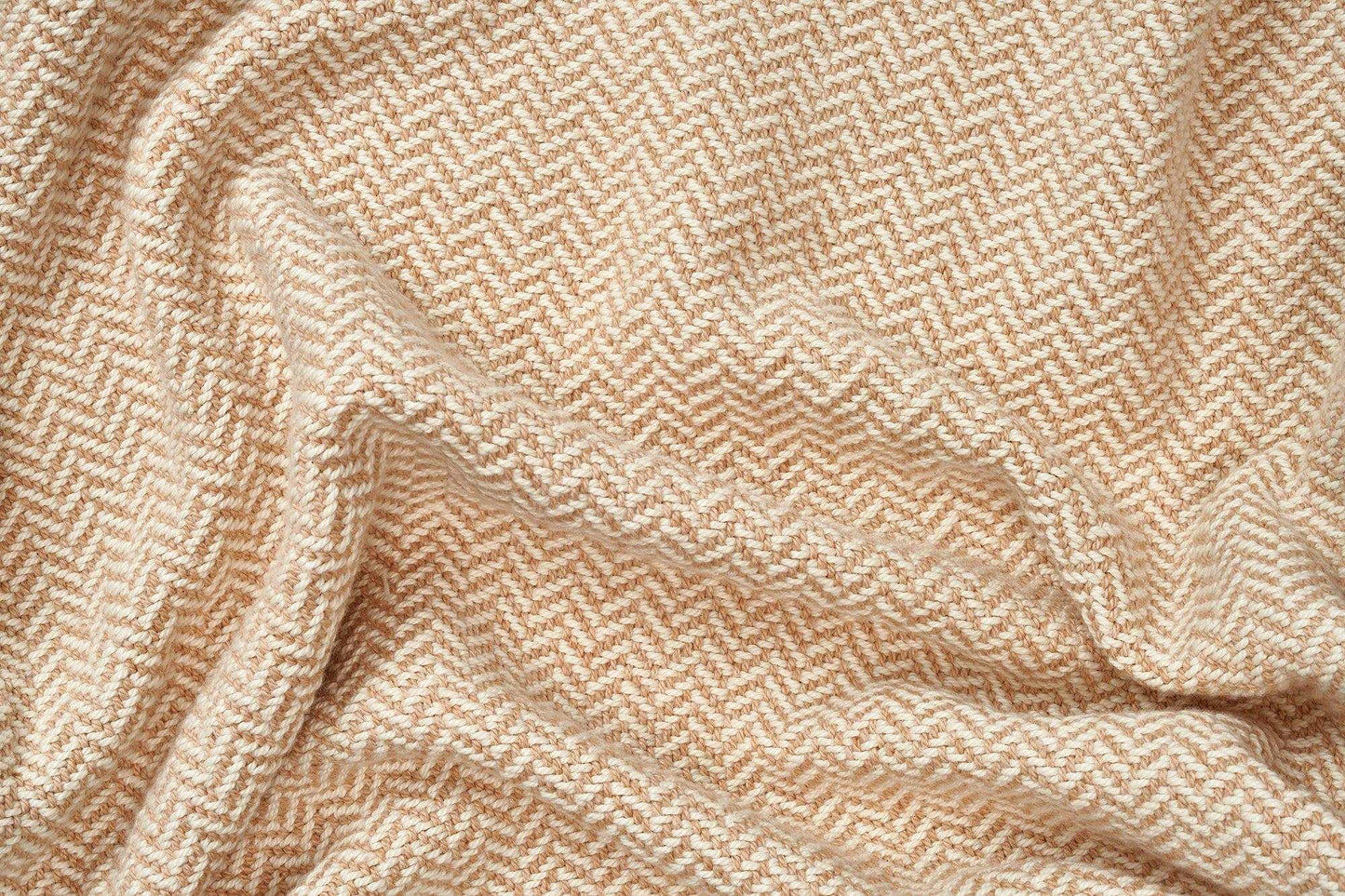 Soft beige herringbone weave cotton blanket with cozy texture for sofa or bed