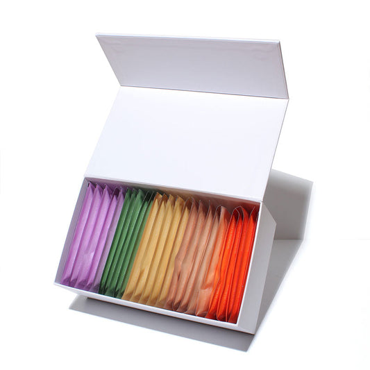 Box of assorted Organic Plant Protein and Superfood Smoothie Mix packets in five colorful varieties