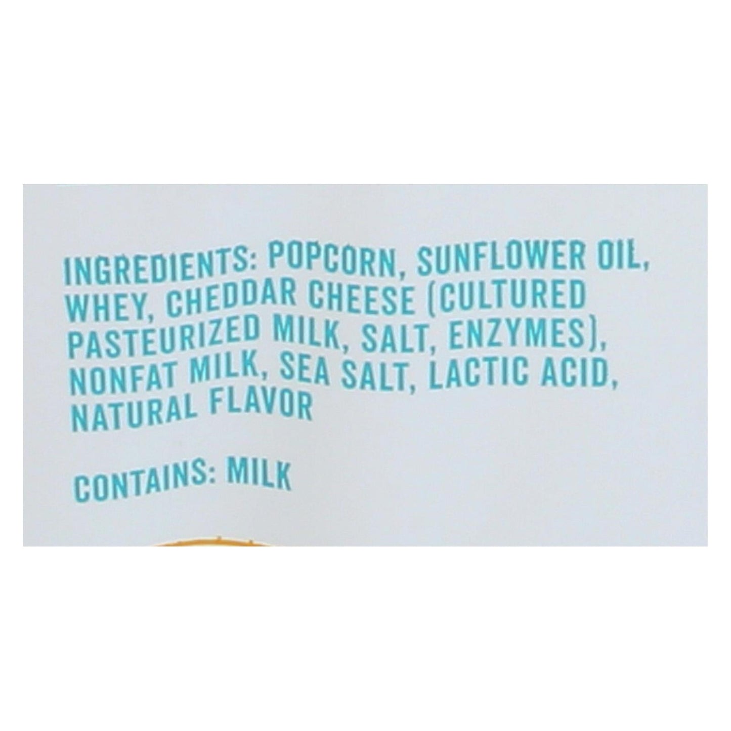 Close-up of Angie's Kettle Corn Boom Chicka Pop White Cheddar Popcorn ingredients label showing popcorn, sunflower oil, whey, cheddar cheese, milk, sea salt, and natural flavor.