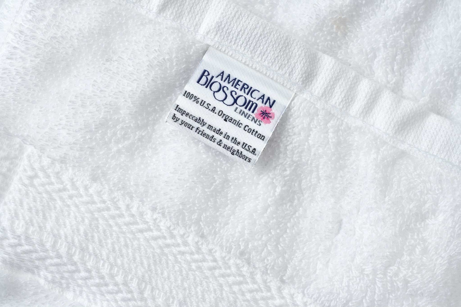 White luxury bathroom washcloth made of 100% USA organic cotton with premium softness and high absorbency
