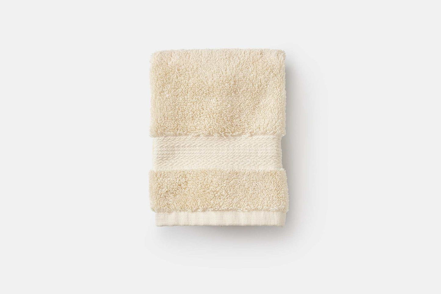 Luxury USA cotton bathroom washcloth folded showing soft, absorbent 700 GSM texture