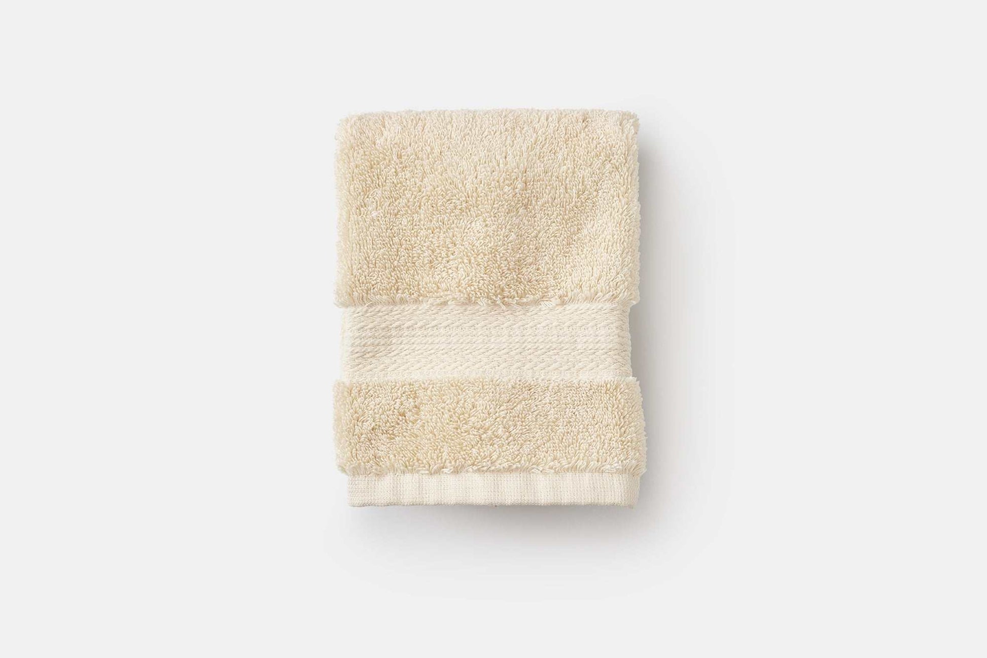 Luxury USA cotton bathroom washcloth folded showing soft, absorbent 700 GSM texture