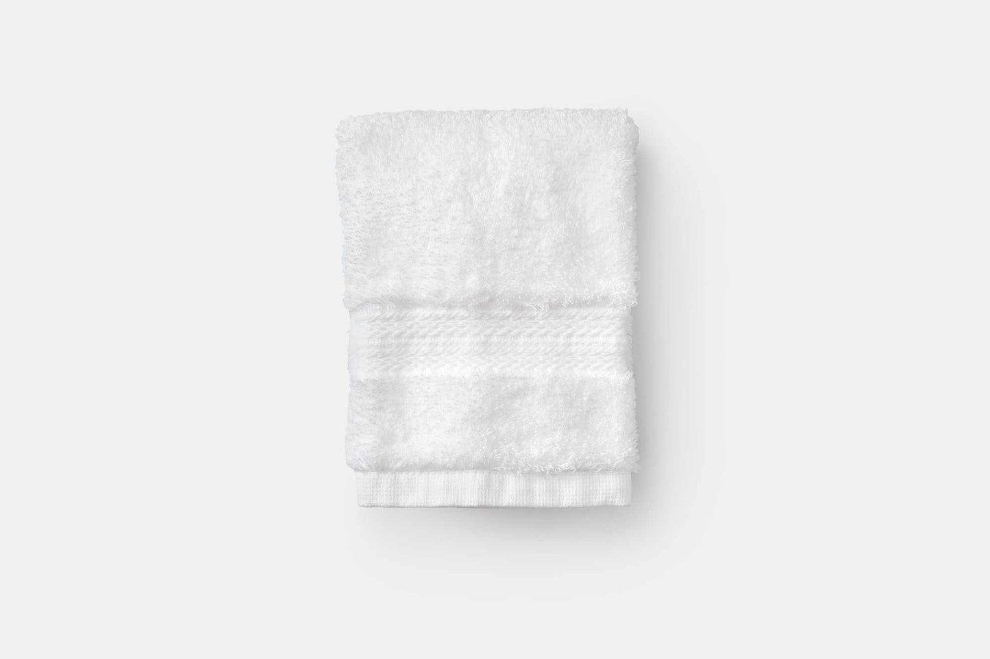 Soft white bathroom washcloth made of luxury USA cotton with 700 GSM absorbency