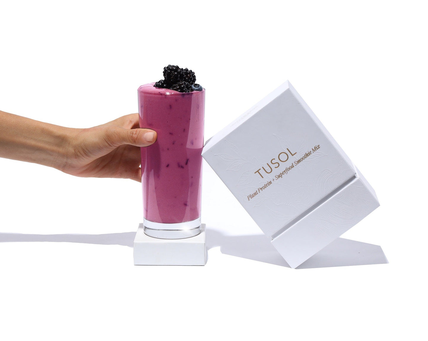TUSOL Wellness Essentials Starter Kit with organic superfood smoothie and branded packaging