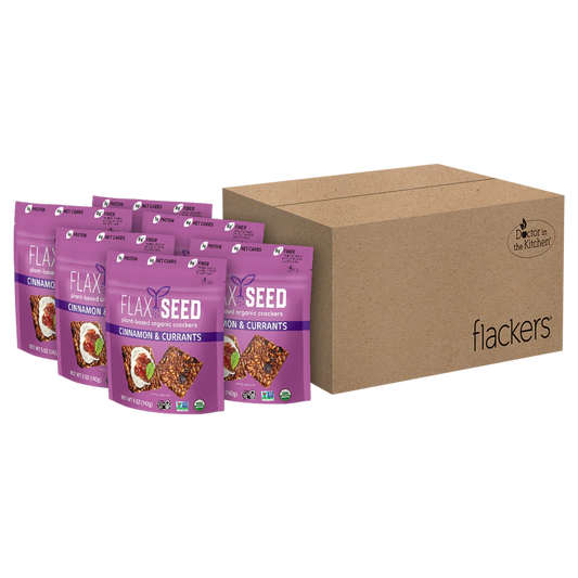 6-pack Cinnamon and Currants Flackers organic flaxseed crackers with cinnamon and currants, gluten-free, vegan, keto-friendly, in purple resealable bags next to a cardboard box