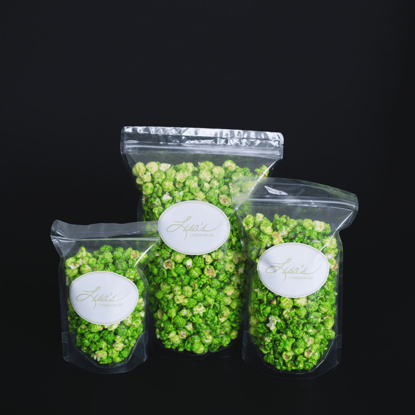Mountain Mist Popcorn in clear resealable bags with bright green candied lemon and lime flavor and fizzy powder coating
