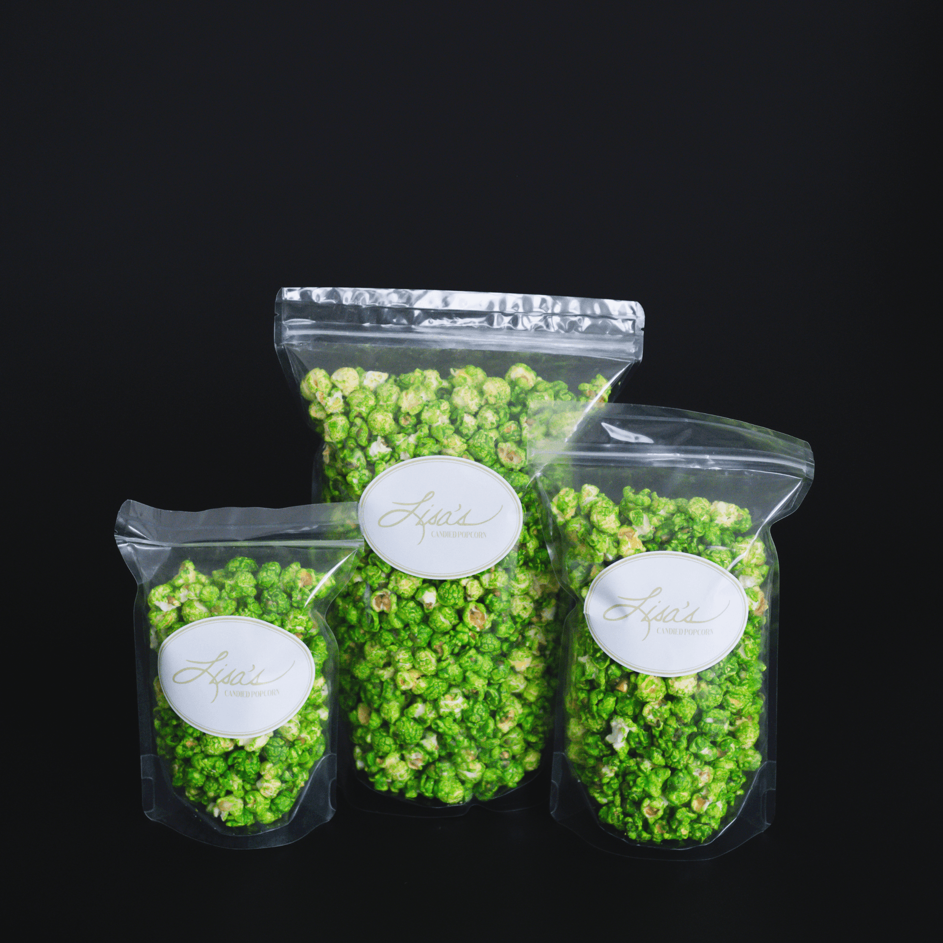 Mountain Mist Popcorn in clear resealable bags with bright green candied lemon and lime flavor and fizzy powder coating