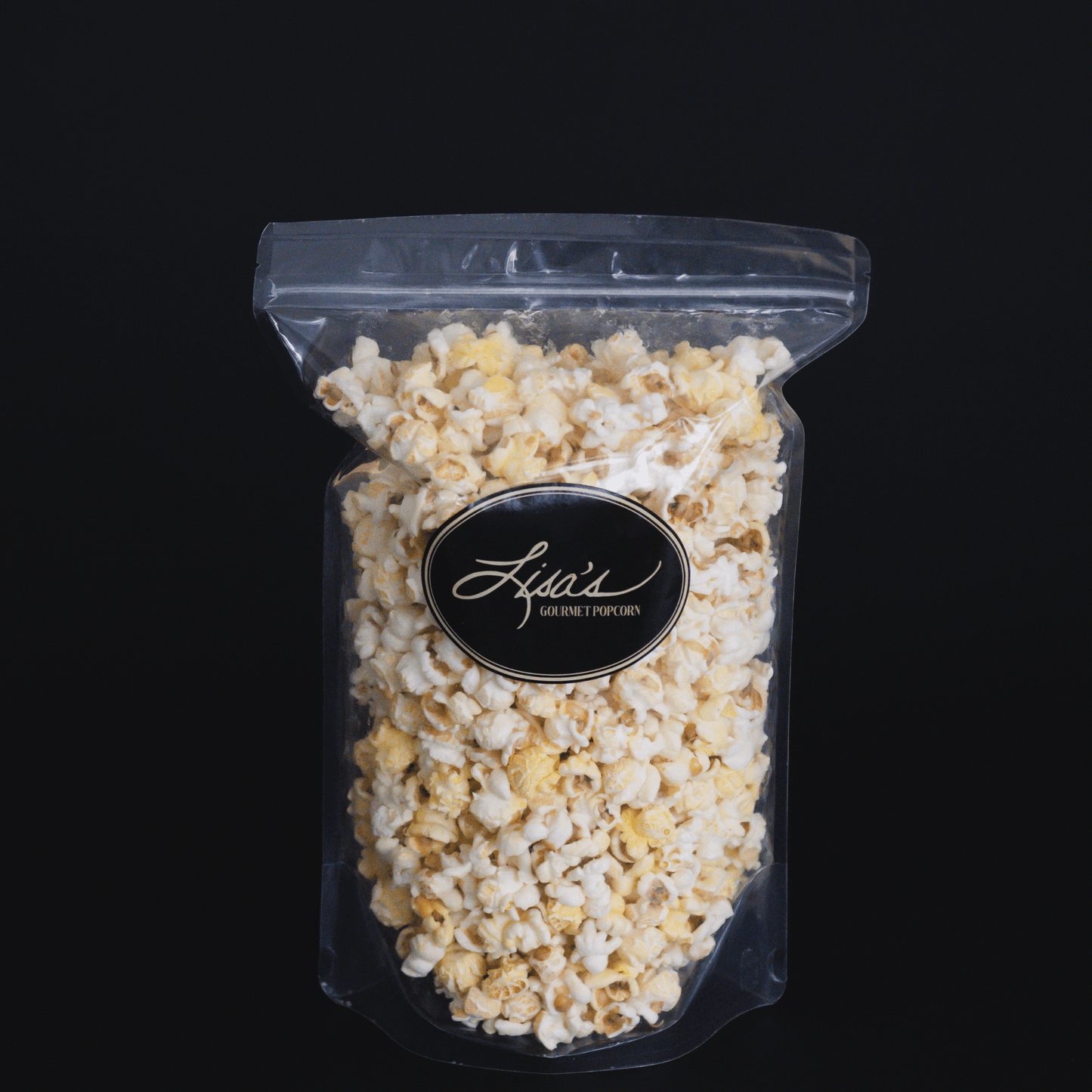 Lisa's Gourmet White Cheddar Popcorn in resealable bag for movie nights and snacks